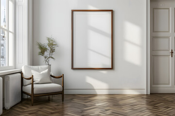 Fototapeta premium Vertical empty frame for wall art mockup. Modern boho room with minimalist chair, table, lamp and neutral decor.