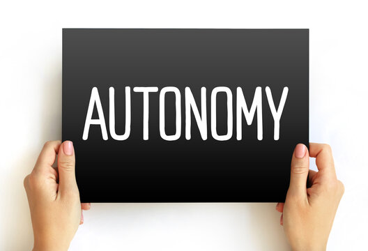 Autonomy text on card, concept background