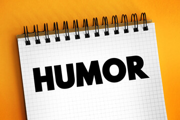 Humour - the quality of being amusing or comic, especially as expressed in literature or speech, text concept on notepad