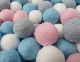 Colourful balls made of felt as background. 
Pale pastel colours. 
