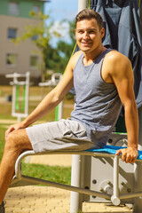 Young man relaxing after outdoor workout