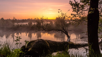 Sunrise over the Suprasl River at the boulevard in Suprasl.