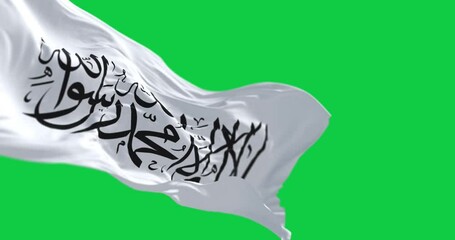 Islamic Emirate of Afghanistan flag waving isolated on green background