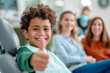 Child Giving Thumbs Up at Dentist.