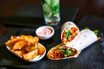 Delicious Wrap and Fries on Wooden Table