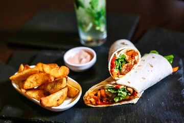 Savory Wrap and Crispy Fries on Table