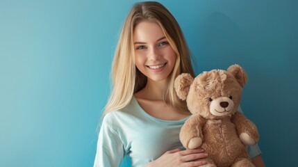 Woman Smiling with Teddy Bear