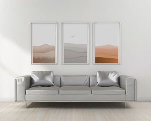 Luxe minimalist living space with a platinum silver sofa and three horizontal poster frames, each featuring minimalist landscape art, on a clean white wall.