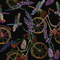 Embroidery lavender flowers, dragonflies and bicycle seamless pattern. Summer and spring floral art. Lifestyle concept. Fashion template for clothes, t-shirt design