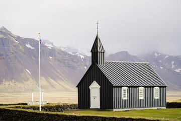 The little clack church of Budir, Budakirkja Beach church. Snaefellsnes peninsula, west Iceland