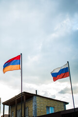 The Russian and Armenian languages are fluttering in the wind