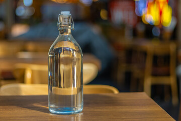 bottle on a table with colourful Bokeh in the background in a Restaurant in Sydney CBD NSW Australia 