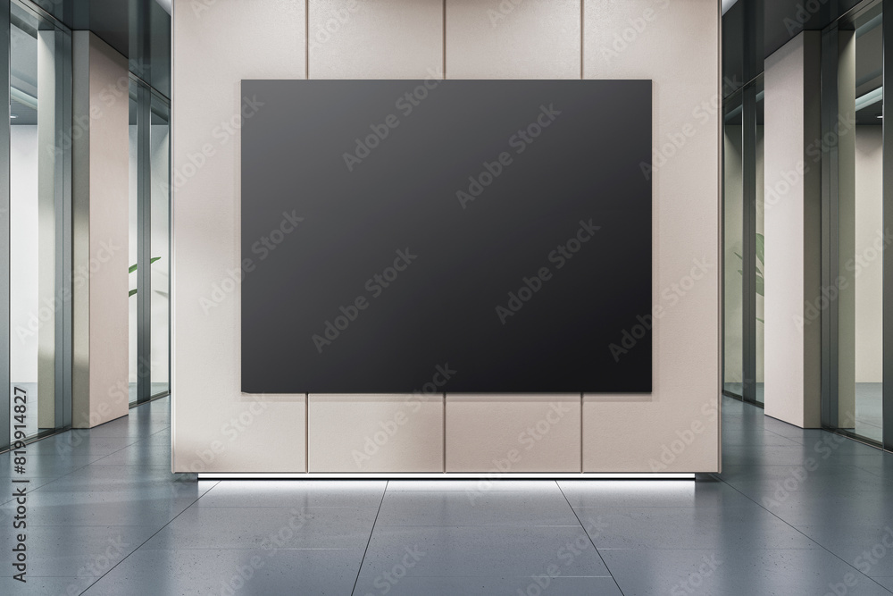 Poster A large black poster on a light wall in a modern corridor, symbolizing a mockup for branding or signage display. 3D Rendering