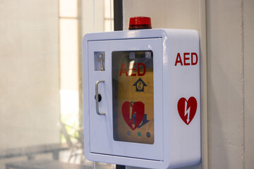 A white box with a red and yellow heart on it