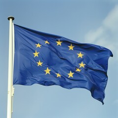 european union flag waving in the wind high on a pole