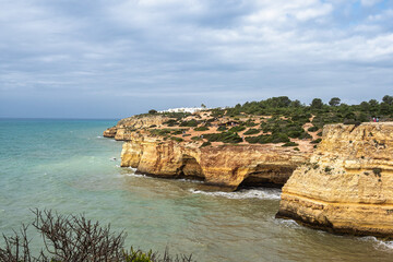 Portuguese coast in Benagil, Algarve, Portugal. Praia da Corredoura. Seven Hangging Valleys Trail.