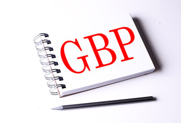 GBP word on notebook on white background