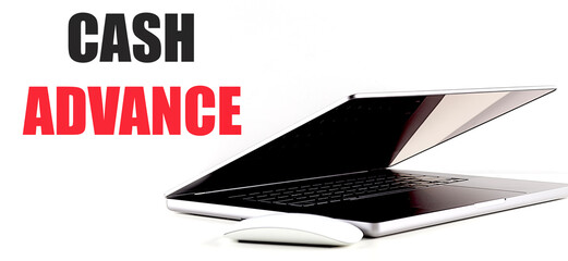 CASH ADVANCE text on white background with laptop and mouse