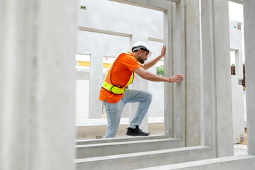 Engineer working at construction site.