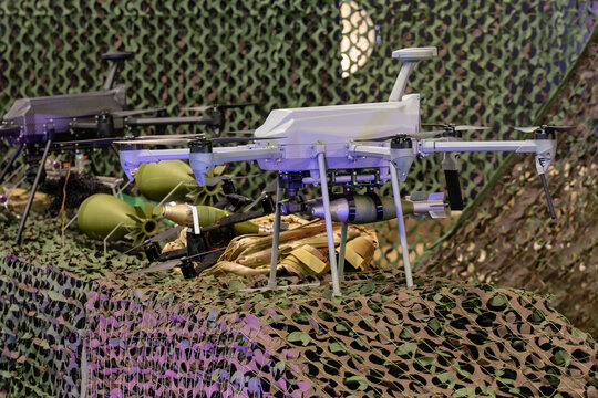 Military drones armed with bombs.