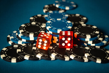 Popular dice game on a poker table in a club. A successful combination of two dice brought a lot of winning chips