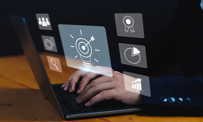 Businessman's Strategic Planning and Creative Thinking, Target Goals and Success with Laptop Icon...