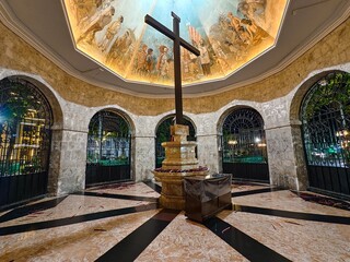 Cebu City, Philippines - May 12, 2024: The famed Magellan's Cross at night, showcasing its...
