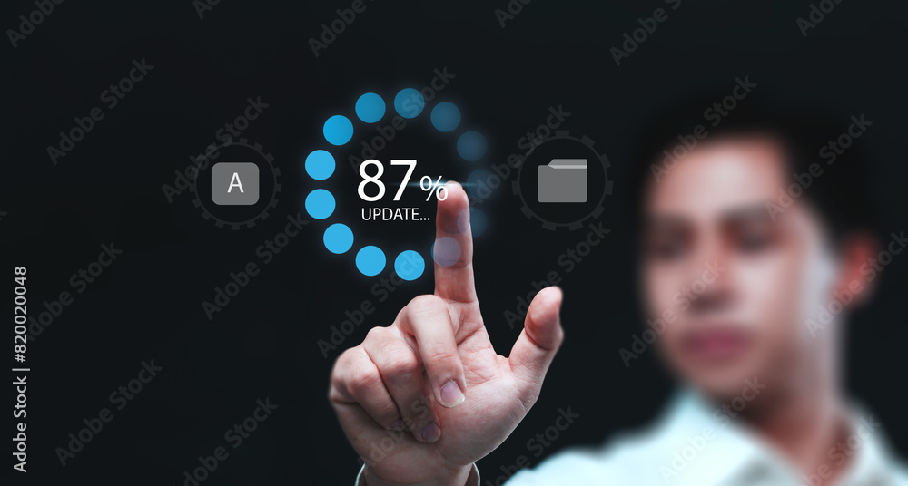 Fototapete Updating computer system software application installation for devices to be up to date with the new version. Hand interacting with graphics icon updating function screen loading on computer laptop.