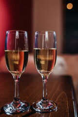 a splash of champagne from the glass where the wedding rings were thrown