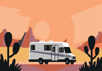 A white RV is parked in the desert