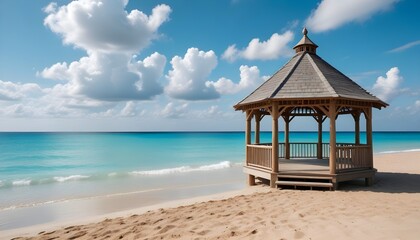 A gazebo on a sandy beach with turquoise blue water and a cloudy sky in the background