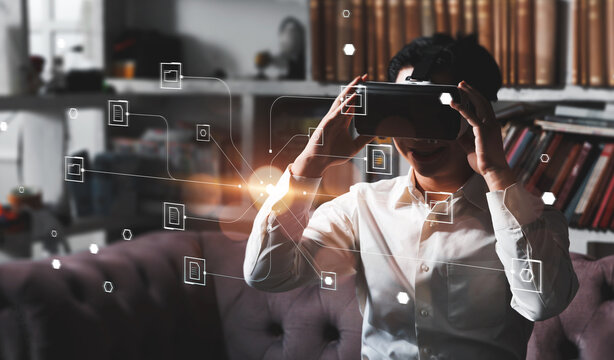 Businessman worker using VR virtual reality augment headset gear folder data and document management system DMS, information computer system storage data technology, document sharing and transfer.