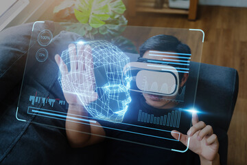 Asian man using virtual reality VR scanning face ID to unlock security access with facial recognition technology for identification, with graphical tech illustration.