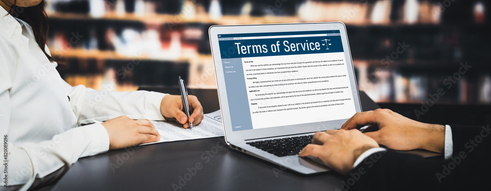 Poster online term of service conditions showing savvy rules and regulations in using the website on a lapt