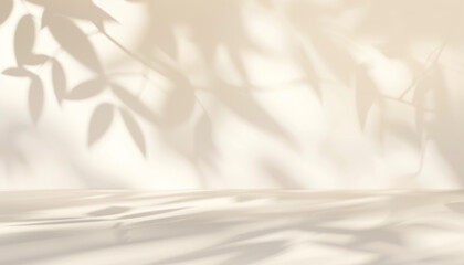 Beuty abstract background in neutral beige colors for product presentation. Shadows of vegetative leaves on wall for modern minimalist mockup backdrop.