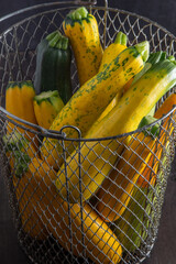 Yellow green leopard spotted zucchini. Vegetables on the table. vegetable marrow harvest. Food...