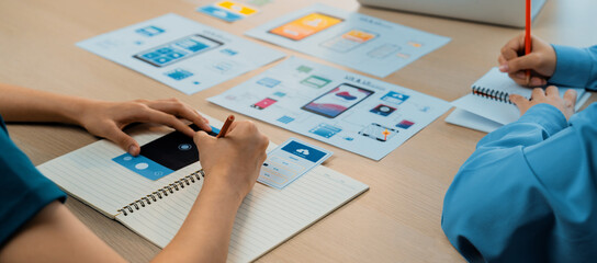 Panorama banner of startup company employee planning on user interface prototype for mobile...