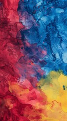 Brightly colored paint is mixed into a large piece of paper