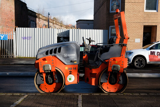 Glasgow Scotland: 12th Feb 2024 A hamm steel drum roller parked on sideside during a sunny morning