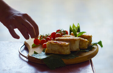 small tomatoes and lavash on the board