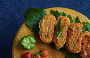 small tomatoes and lavash on the board