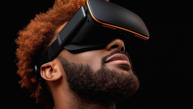 African american man with afro hairstyle wearing virtual reality goggles. Modern concept technology, innovation, and entertainment. Smiling person indoors, futuristic vision simulation.