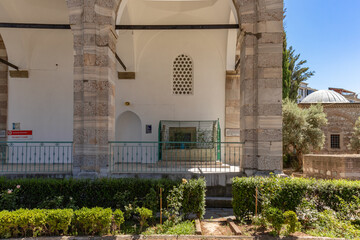 View of the Karacabey tomb under the arched columned entrance, next to the main entrance of the...