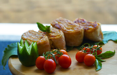 small tomatoes and lavash on the board