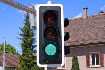 Traffic light with green led light at Swiss City of Z&uuml;rich on a sunny spring day. Photo taken May 19th, 2024, Zurich, Switzerland.