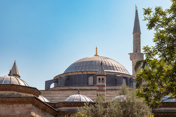 A beautiful view of the Shepherd Mustafa Pasha Mosque and Complex from the outside in a sunny weather. View of the dome and minaret.
