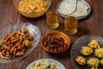 set table meat bread couscous uzvar for a meal holiday of sacrifice Kurban Bayram