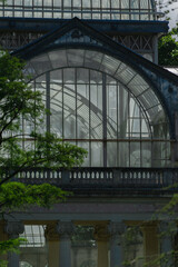 Photograph of the Crystal Palace in El Retiro park. Architecture. City of Madrid. Green area. European tour