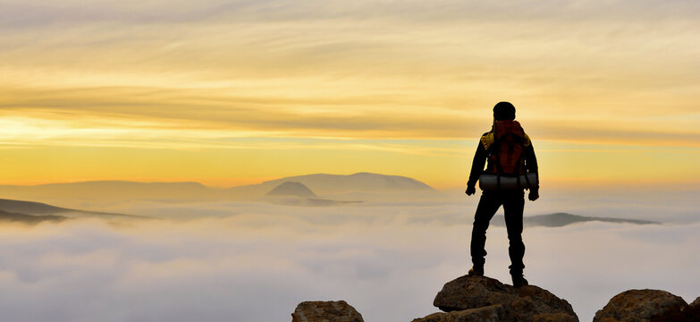 Man Looking At Mountains