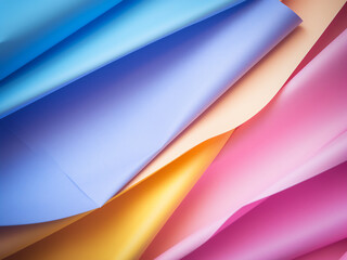 Fototapeta premium Blue, yellow, and pink-tinted sheets offer a colorful palette for creative projects